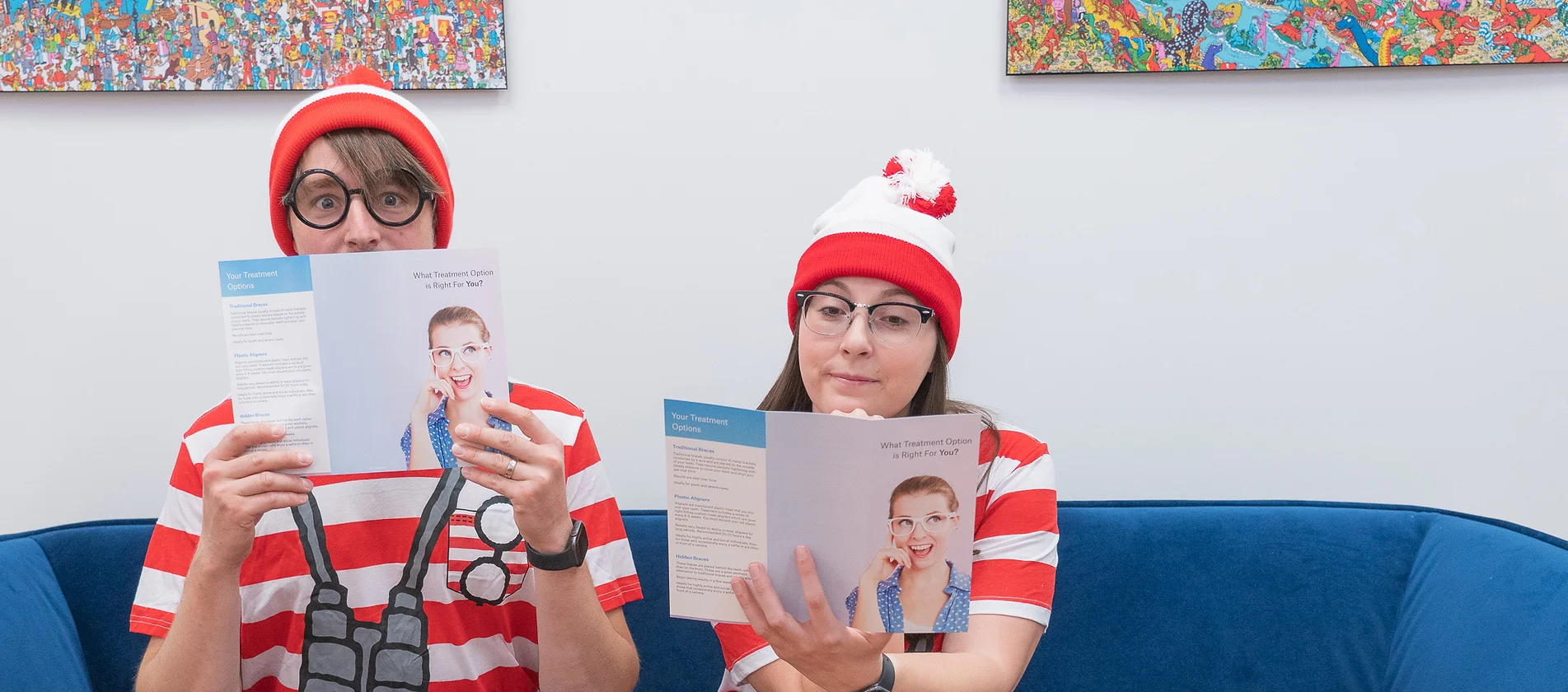 Dr. Alexander Blaseio and Maleah Morett dressed in Where's Waldo Costumes in the Genuine Orthodontics waiting room in Brentwood, TN